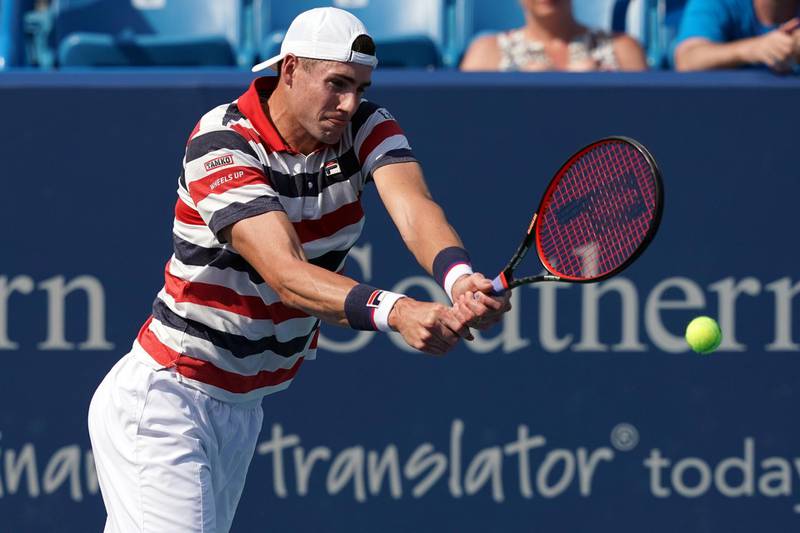 Aug 13, 2018; Mason, OH, USA; John Isner (USA) returns a shot against Sam Querrey (USA) in the Western and Southern tennis open at Lindner Family Tennis Center. Mandatory Credit: Aaron Doster-USA TODAY Sports