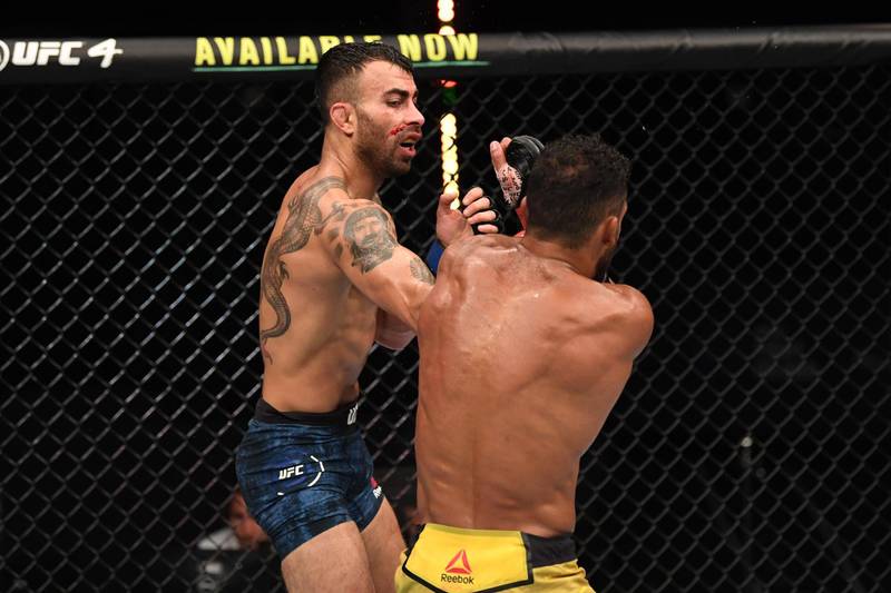 Makwan Amirkhani (L) of Finland punches Edson Barboza of Brazil in their featherweight bout during the UFC Fight Night event inside Flash Forum on UFC Fight Island in Abu Dhabi, United Arab Emirates. Josh Hedges/Zuffa LLC via Getty Images