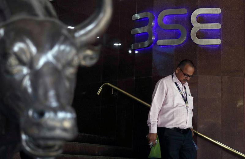 FILE PHOTO: A man walks out of the Bombay Stock Exchange (BSE) building in Mumbai, India, January 3 2020. REUTERS/Francis Mascarenhas/File Photo