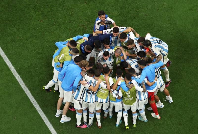 Argentina players celebrate after their win. Getty