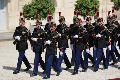 A French guard of honour awaits the arrival of Sheikh Mohamed to Elysee Palace. Chris Whiteoak / The National