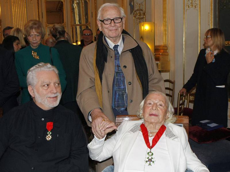 With Pierre Cardin, centre, and Marie-Louise Carven-Grog after being awarded the Legion of Honour by French Culture Minister Frederic Mitterrand in Paris in 2010. AP Photo