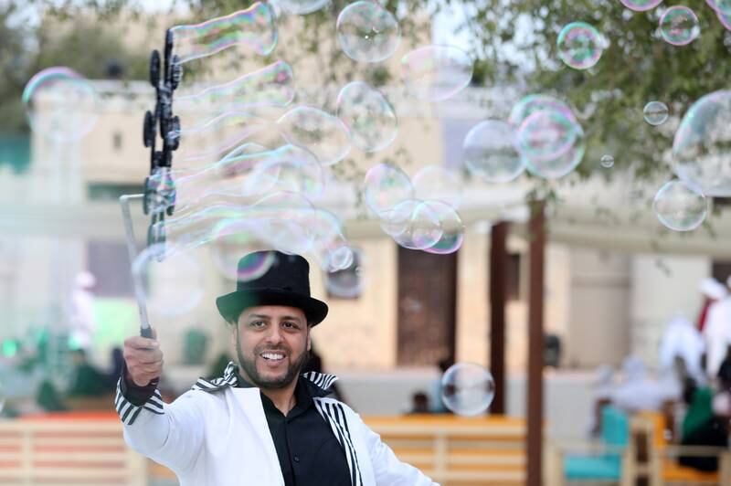 Brahim Chafiq makes bubbles to entertain children at Hatta Cultural Nights