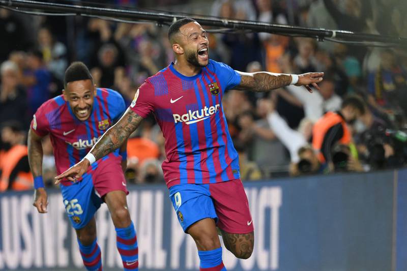 Memphis Depay celebrates after scoring for Barcelona in the La Liga match against Celta Vigo at Camp Nou in May, 2022.  AFP