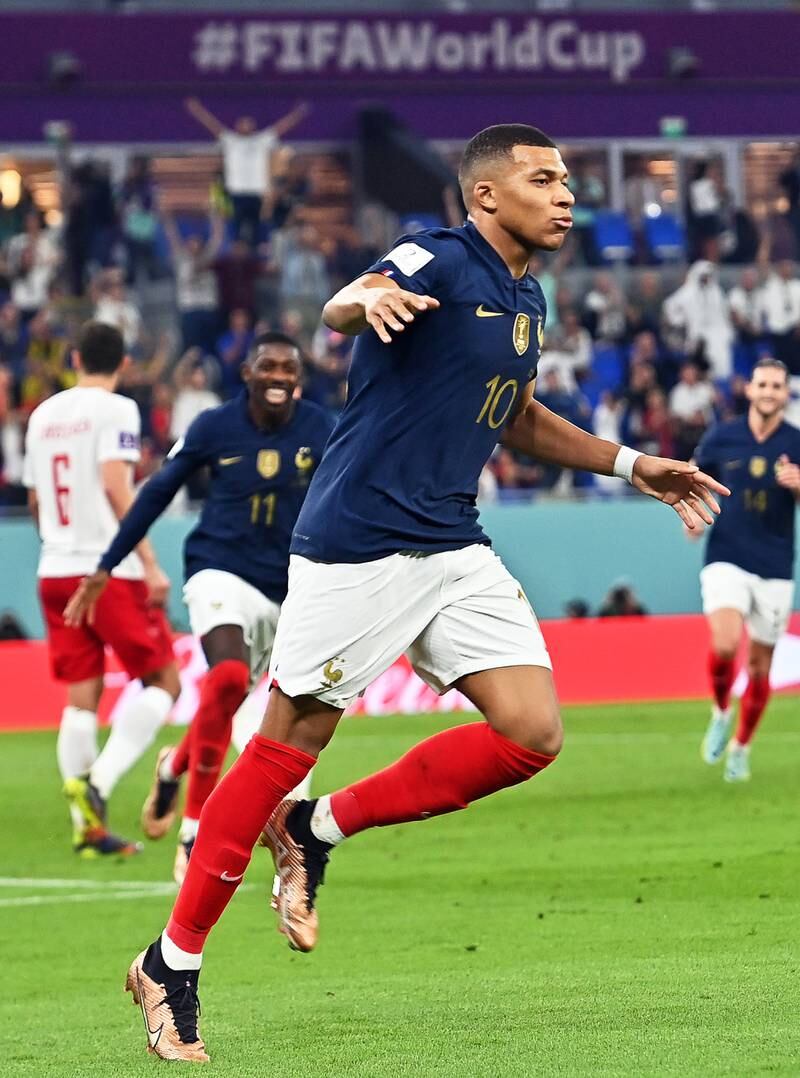 Kylian Mbappe celebrates after scoring the first goal. EPA