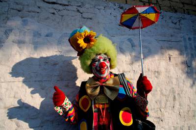 A clown poses during International Clown Day in Guadalajara, Mexico. AFP