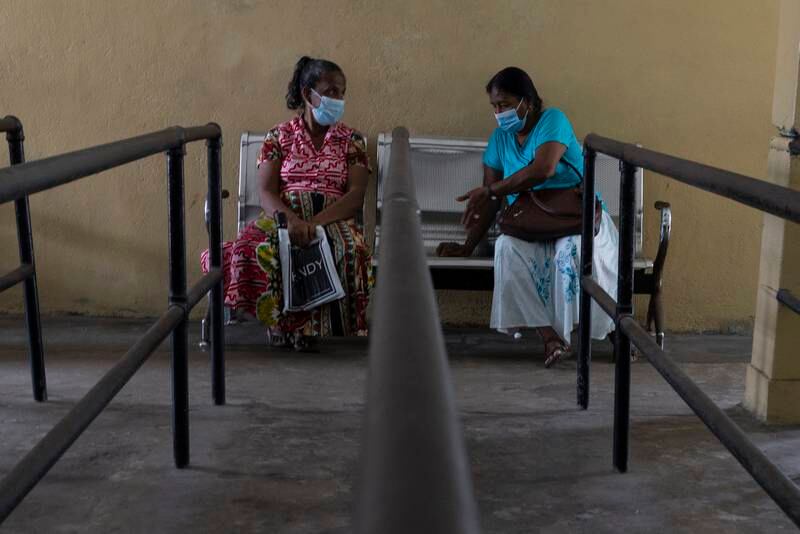 Patients wait to receive drugs at Colombo South Teaching Hospital in Colombo. Getty Images