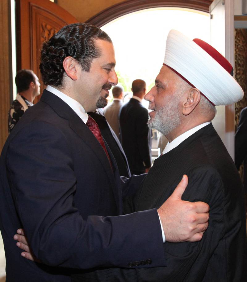 Mr Hariri greets Lebanon's newly-elected Sunni Mufti Sheikh Abdul Latif Deryan, in 2014.