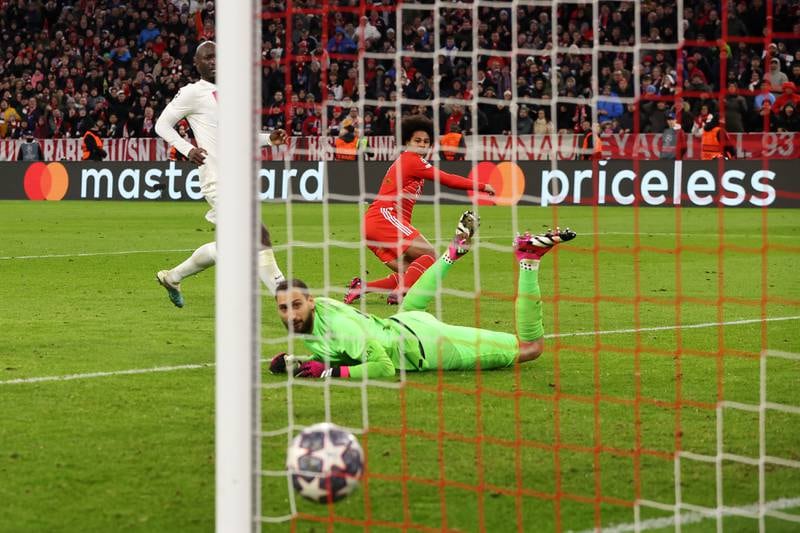 PSG goalkeeper Gianluigi Donnarumma watches Serge Gnabry's shot hit the back of the net to make 2-0 to Bayern. Getty