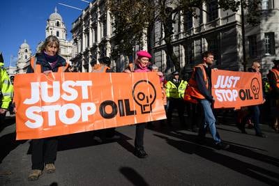 Members of Just Stop Oil block traffic in Whitehall. Getty Images
