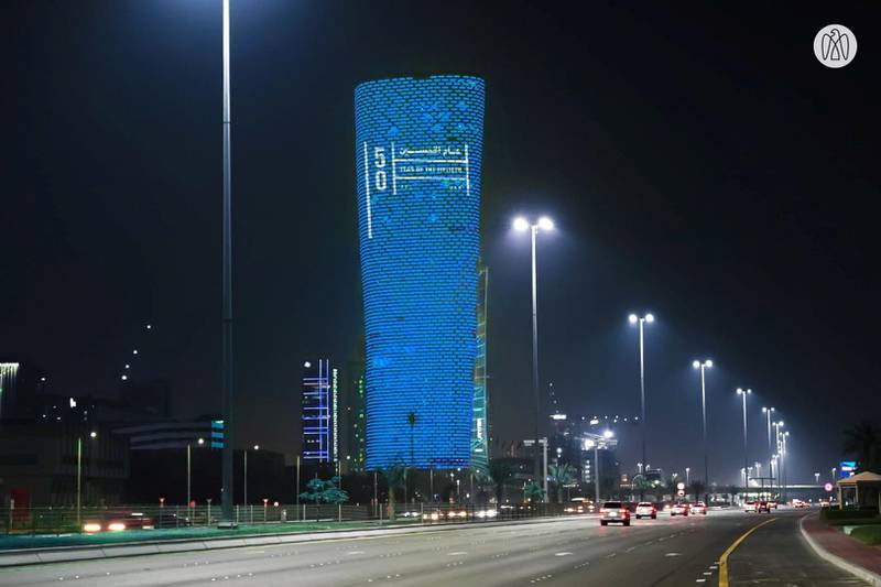Capital Gate on Khaleej Al Arabi Street lights up in celebration of the Year of the 50th. Abu Dhabi Media Office