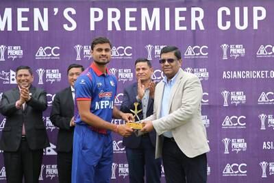 Gulsan Jha of Nepal received receives the Player of the Match award.
