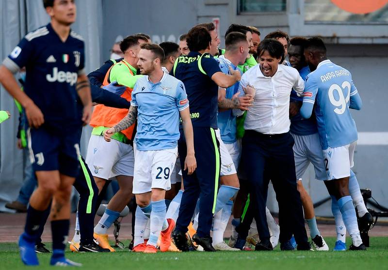 Lazio celebrate their injury-time equaliser from  Felipe Caicedo. AFP
