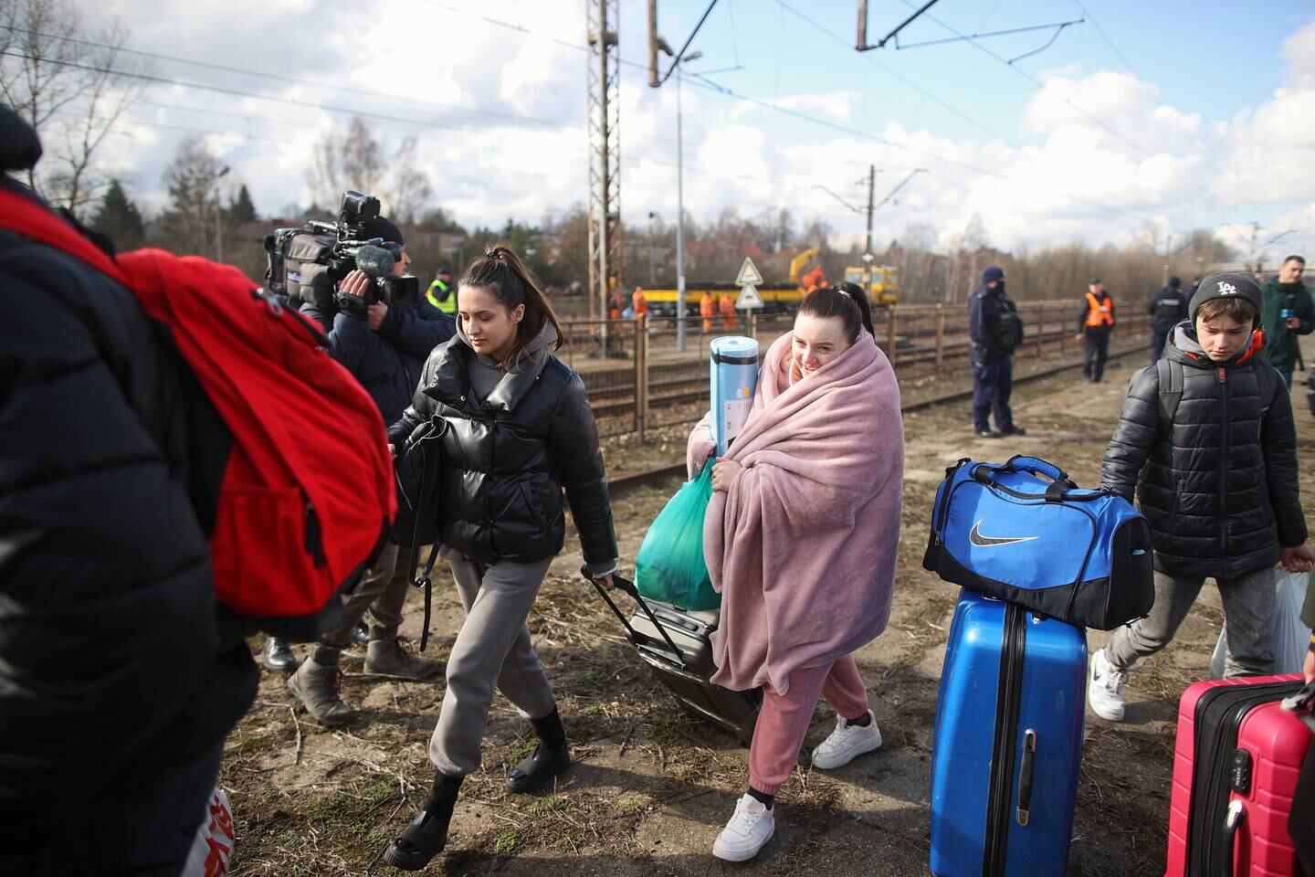 Ukrainians arrive in Olkusz, Poland, after taking a train from Lviv, western Ukraine. EPA / POLAND OUT