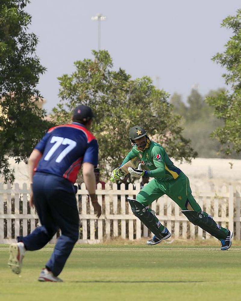 Pakistan’s Shoaib Malik strikes during an international friendly match against Nepal at Academy Oval grounds at Zayed Cricket Stadium in Abu Dhabi. Ravindranath K / The National