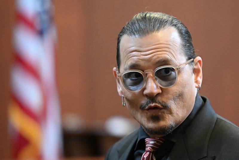 Actor Johnny Depp arrives for the 13th day of the trial. AP