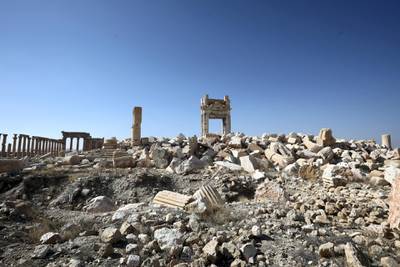 A picture shows a partial view of the damaged Temple of Bel, in Syria's Roman-era ancient city of Palmyra on February 7, 2021, in the country's central province of Homs. - Syria has six sites listed on the UNESCO elite list of world heritage and all of them sustained some level of damage in the 10-year war. Besides Palmyra and Aleppo, the ancient cities of Damascus and Bosra also sustained some damage. (Photo by LOUAI BESHARA / AFP)