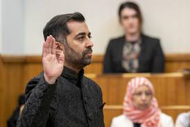 Humza Yousaf takes the oath as he is sworn in as First Minister of Scotland at the Court of Session, Edinburgh. PA