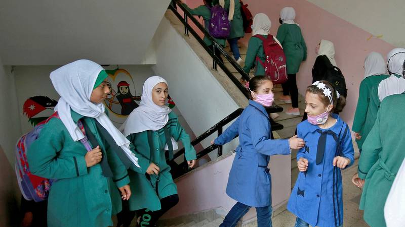 An image that illustrates this article Fourth wave could delay return to classrooms for Jordan's school pupils