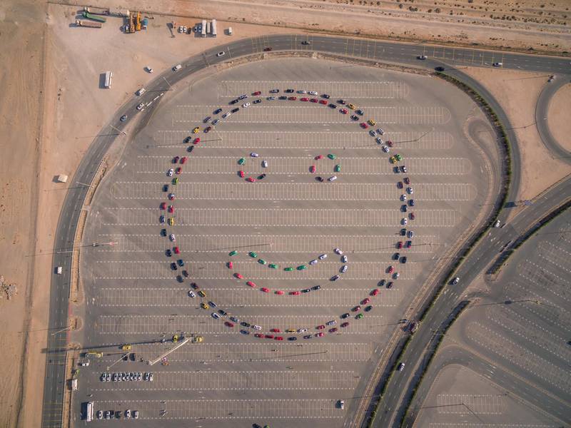 Dubai Police create a smiley face using cars. Courtesy Dubai Police