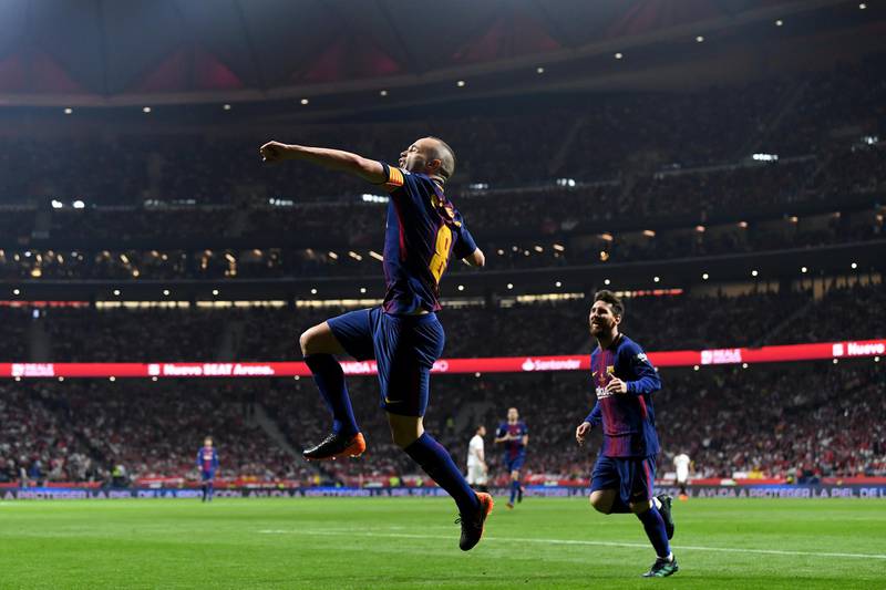 Andres Iniesta celebrates after scoring Barcelona's fourth goal during their Copa del Rey final against Sevilla FC at the Wanda Metropolitano stadium in Madrid. David Ramos / Getty Images