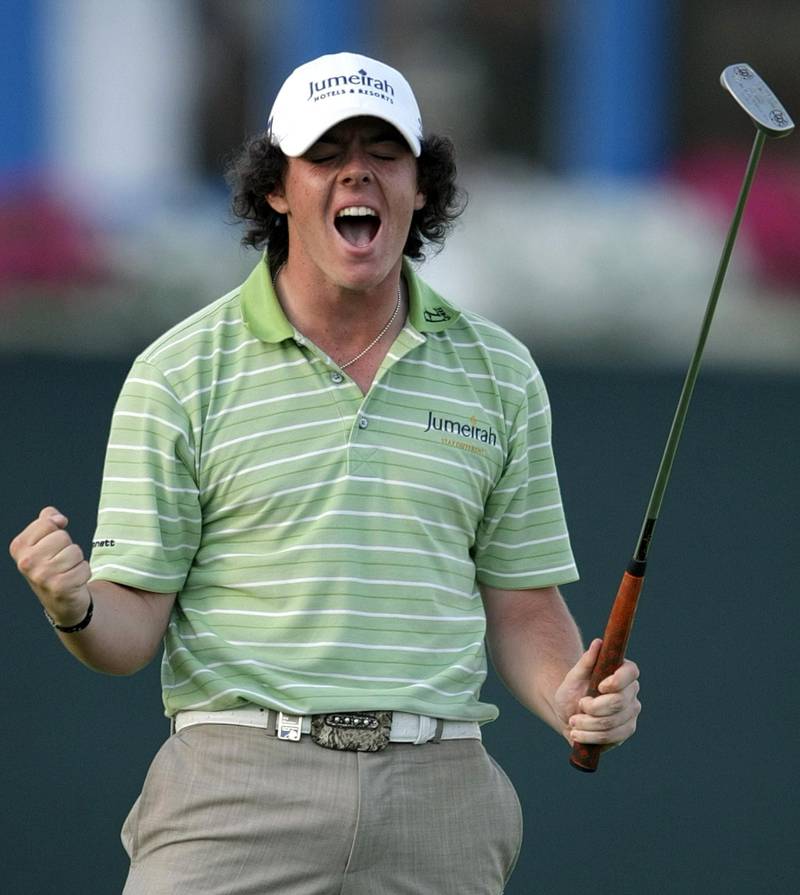 Irish teenager Rory McIlory reacts after winning the Dubai Desert Classic golf tournament on February 1, 2009. McIlroy won the 2.5 million-dollar tournament, but it took a brave four-footer at the last to win it after he had led by six strokes with six to play. He closed with a two-under par 70 for a total of 19-under-par 269 one stroke clear of England's Justin Rose, who closed with a 67 for second place. AFP PHOTO/MARWAN NAAMANI (Photo by MARWAN NAAMANI / AFP)