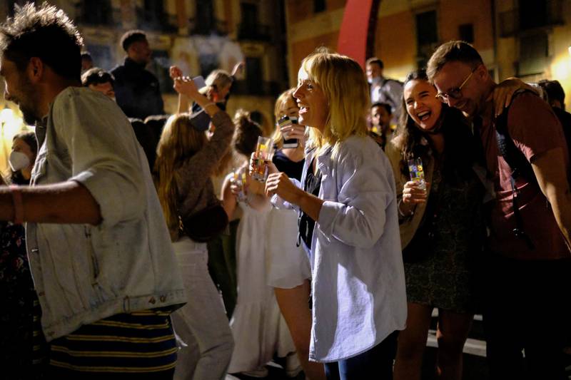 Crowds gather in Born, Barcelona, to celebrate the end of the curfew. Reuters