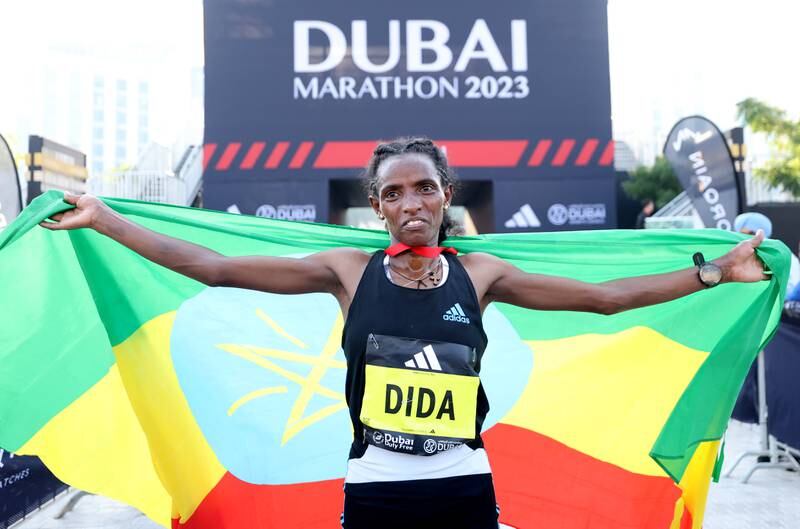 DUBAI, UNITED ARAB EMIRATES - FEBRUARY 12: Dera Dida of Ethiopia celebrates after winning  the Elite Women's race Dubai Marathon 2023 at Expo City on February 12, 2023 in Dubai, United Arab Emirates. (Photo by Francois Nel / Getty Images)