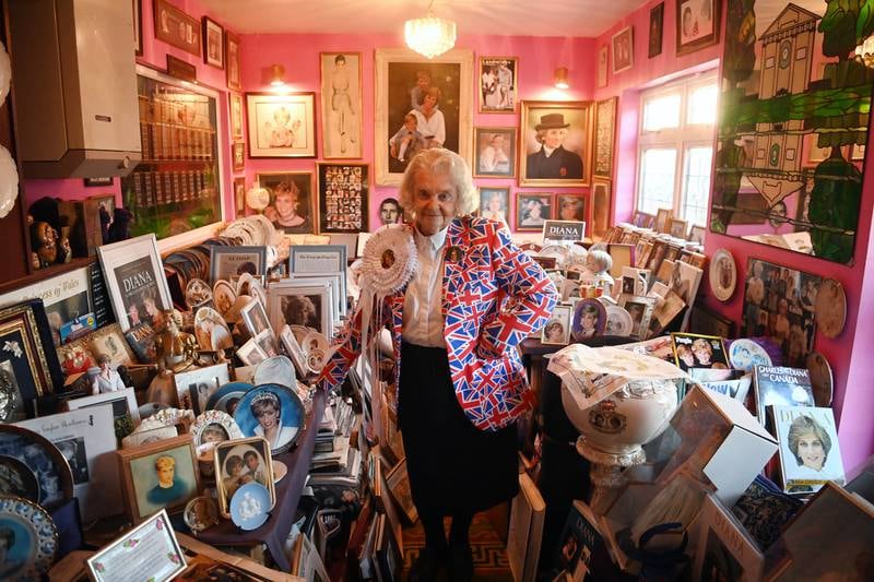 Royal fan Margaret Tyler poses amongst her collection of royal memorabilia in her home in north London, Britain, 17 January 2022 (issued 03 February 2022).  Tyler, 77, has collected thousands of items about Britain's Royal family.  She began collecting 40 years ago, and her collection encompasses four rooms and a bedroom full of memorabilia.  The Platinum Jubilee of Britain's Queen Elizabeth II will mark the 70th anniversary of the British monarch's accession to the throne on 06 February 1952.   EPA / NEIL HALL  ATTENTION: This Image is part of a PHOTO SET
