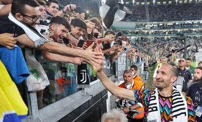 Juventus' Giorgio Chiellini greets fans. EPA