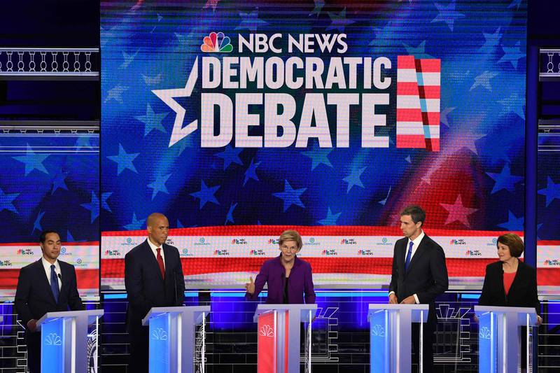 Democratic presidential hopefuls (fromL) former US Secretary of Housing and Urban Development Julian Castro, US Senator from New Jersey Cory Booker, US Senator from Massachusetts Elizabeth Warren, former US Representative for Texas' 16th congressional district Beto O'Rourke and US Senator from Minnesota Amy Klobuchar participate in the first Democratic primary debate of the 2020 presidential campaign season hosted by NBC News at the Adrienne Arsht Center for the Performing Arts in Miami, Florida, June 26, 2019.  / AFP / JIM WATSON
