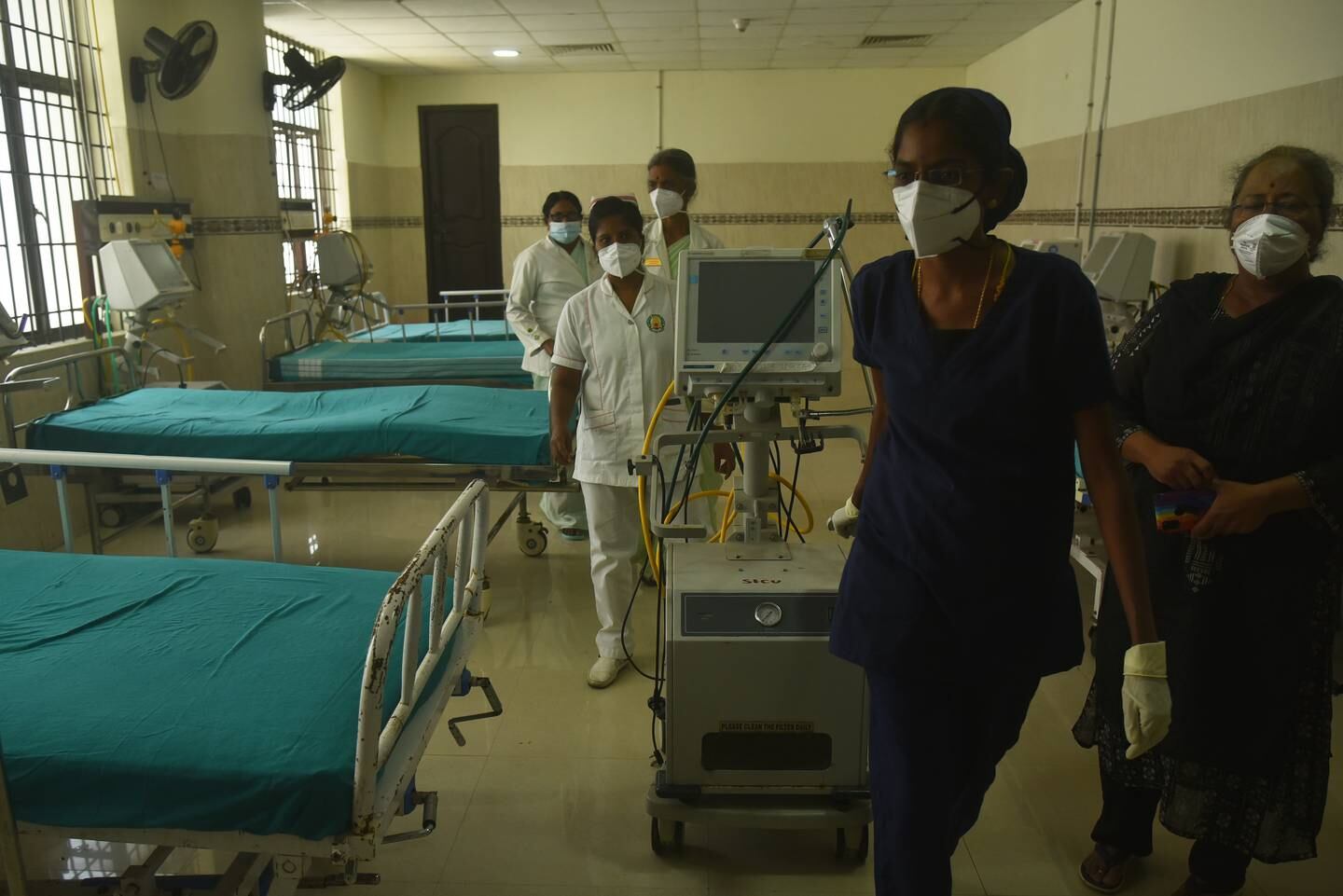 Health workers prepare a Covid-19 ward at a government hospital in Chennai, India. EPA 