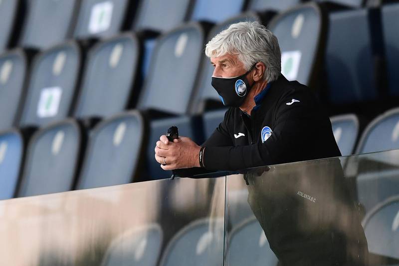 Atalanta manager Gian Piero Gasperini watchesfrom the stands. AFP