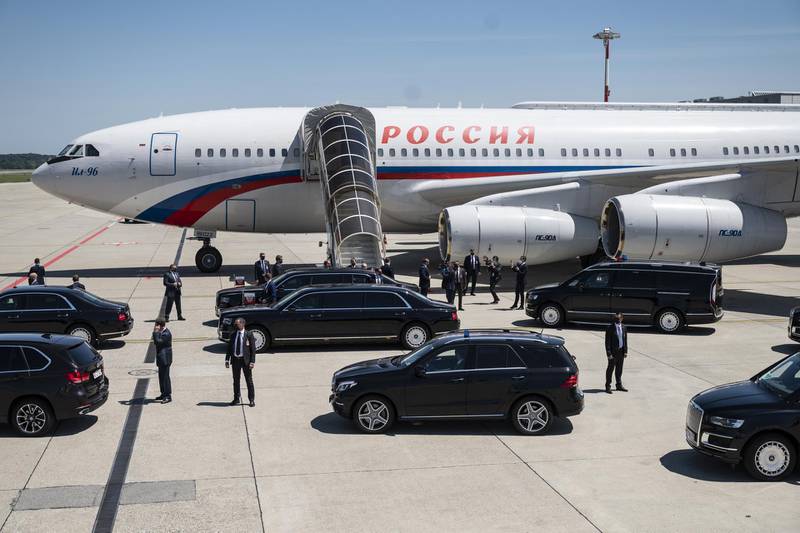 epa09275737 Russian President Vladimir Putin enters the limousine after disembarking from the presidential Ilyushin Il-96-300PU airplane as he arrives at Geneva Airport Cointrin, for a US-Russia summit in Geneva, Switzerland, 16 June 2021. US President Biden and Russian President Putin meet in Geneva on 16 June for face-to-face talks.  EPA/ALESSANDRO DELLA VALLE / POOL