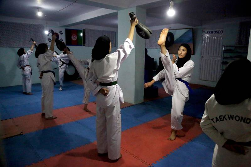 Taekwondo team members practice during a training session in Kabul, Afghanistan. AP