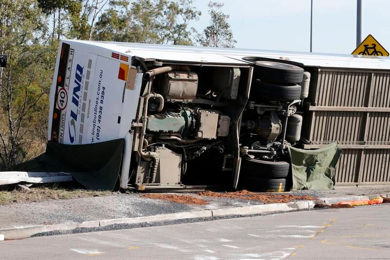 The bus, which overturned at a roundabout. EPA