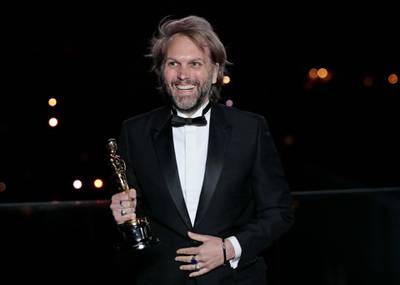 Best Adapted Screenplay: Florian Zeller, for 'The Father', poses with his award during the screening for the 93rd annual Academy Awards in Paris, France on Monday,  April 26, 2021. EPA
