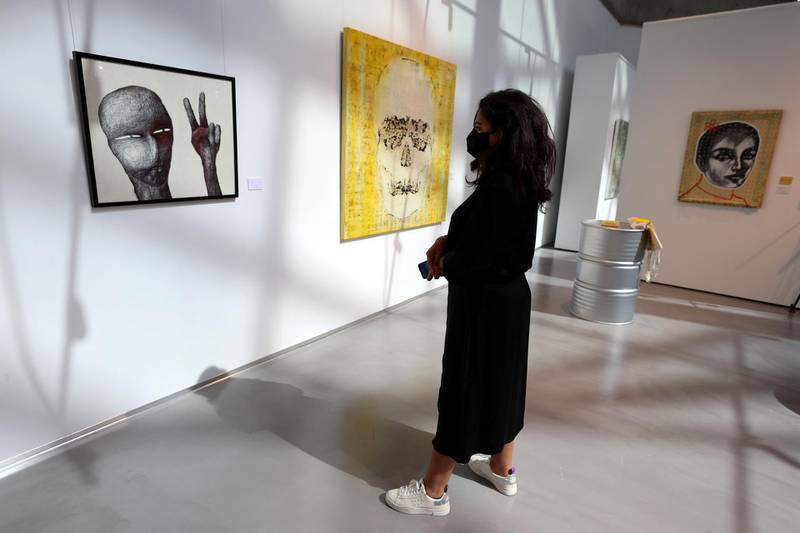 Dubai, United Arab Emirates - Reporter: N/A. Lifestyle. Shopping. A visitor looks round the art section. The opening of THAT, a new concept store in Mall of the Emirates. Dubai. Monday, January 18th, 2021. Chris Whiteoak / The National