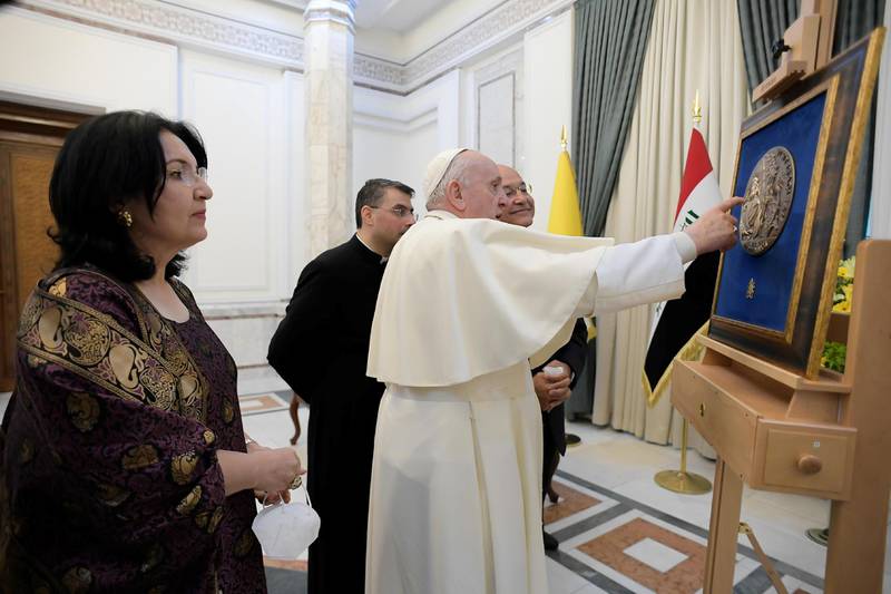 Iraqi President Barham Salih and Pope Francis meet at the Presidential Palace. Reuters
