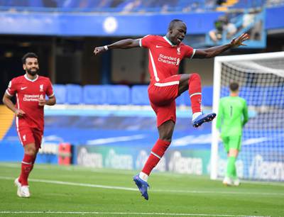 epa08684460 Sadio Mane of Liverpool celebrates scoring his team's second goal during the English Premier League match between Chelsea vs Liverpool in London, Britain, 20 September 2020.  EPA/Michael Regan / POOL EDITORIAL USE ONLY. No use with unauthorized audio, video, data, fixture lists, club/league logos or 'live' services. Online in-match use limited to 120 images, no video emulation. No use in betting, games or single club/league/player publications.
