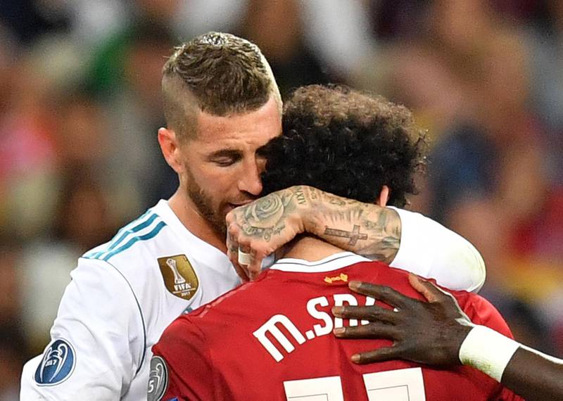 Ramos consoles Salah as he realises he is unable to continue.  Georgi Locovski / EPA