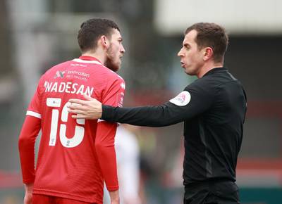 Referee Peter Bankes speaks with Crawley Town's Ashley Nadesan during the FA Cup match against Leeds United at the People's Pension Stadium. Reuters