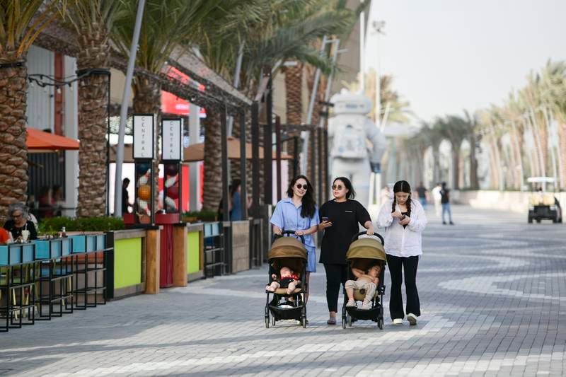 Visitors stroll along the Yas Bay Watefront during Eid in Abu Dhabi. 