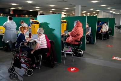 NHS staff administer the AstraZeneca Covid-19 vaccine in 2021 in St Helens. Getty Images