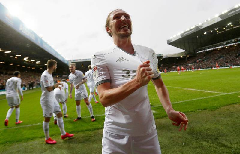 Soccer Football - Championship - Leeds United v Bristol City - Elland Road, Leeds, Britain - February 15, 2020  Leeds United's Luke Ayling celebrates scoring their first goal  Action Images/Ed Sykes  EDITORIAL USE ONLY. No use with unauthorized audio, video, data, fixture lists, club/league logos or "live" services. Online in-match use limited to 75 images, no video emulation. No use in betting, games or single club/league/player publications.  Please contact your account representative for further details.