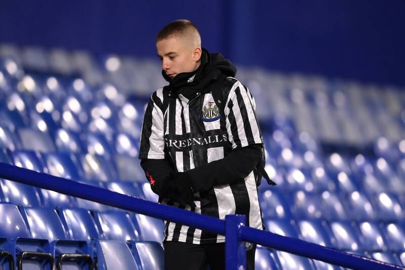 A Newcastle fan looks dejected after the defeat. Getty