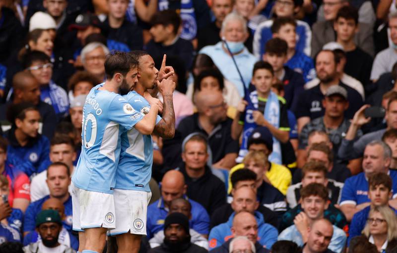 Manchester City's Gabriel Jesus celebrates with Bernardo Silva after scoring. Reuters
