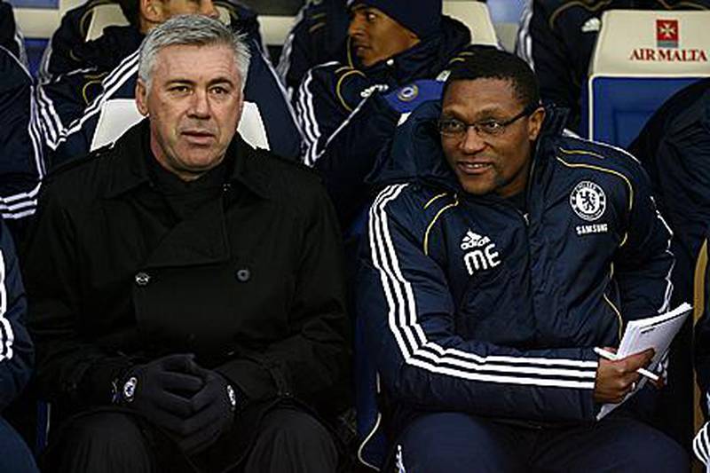 Carlo Ancelotti, left, the Chelsea manager, alongside his new first-team assistant manager Michael Emenalo, during yesterday’s game against Birmingham City.