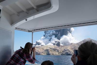 The White Island Volcano eruption is seen from a boat used to rescue tourists. Courtesy of Michael Schade /Twitter