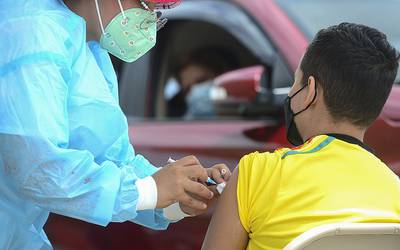A boy receives the first dose of the Pfizer/BioNTech Covid-19 vaccine in Tegucigalpa, Honduras. AFP